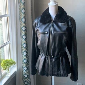 Black leather bomber jacket with fur collar